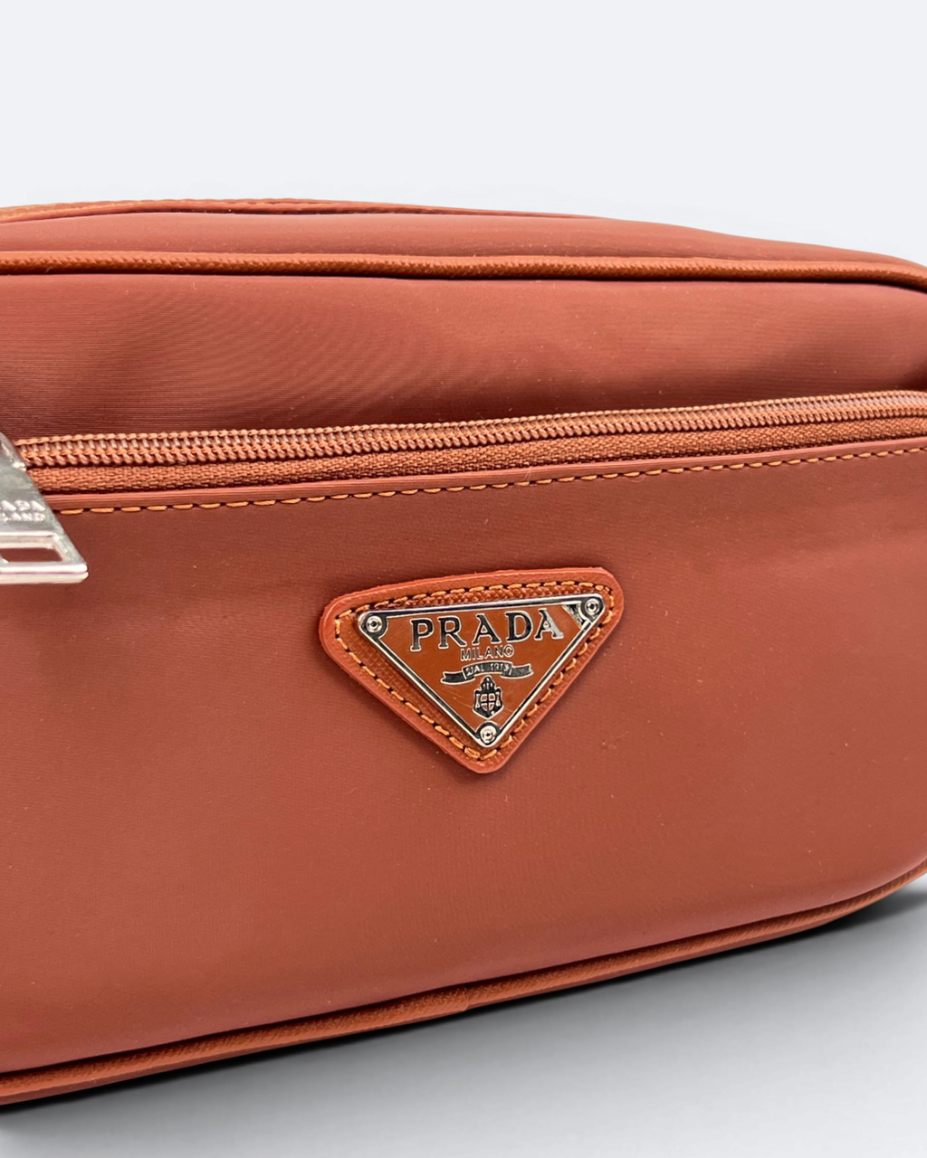 Prada - Logo Plate Hand Pouch Bag - Brown